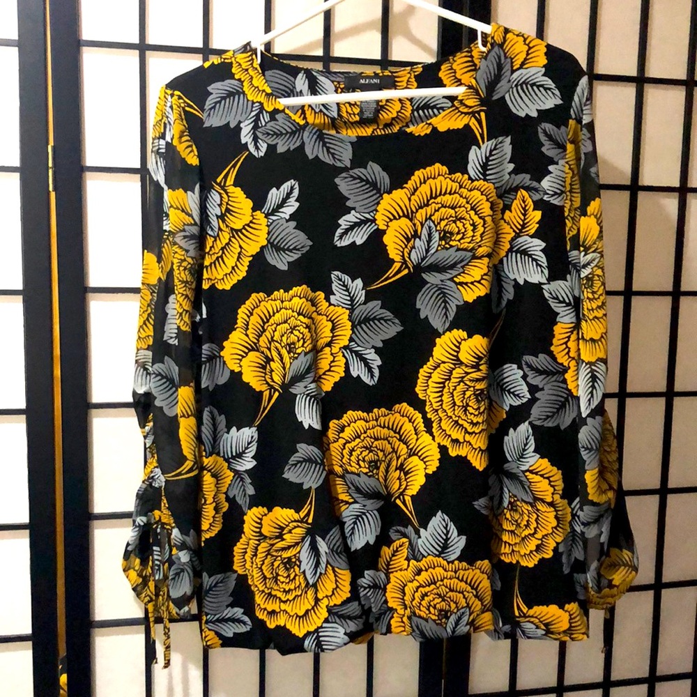 A black and yellow floral blouse